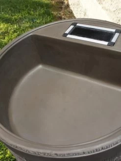 Round Rain Barrel With Planter, 35 Gallons -The Garden Shed Store 8612856WALNT 02V tif